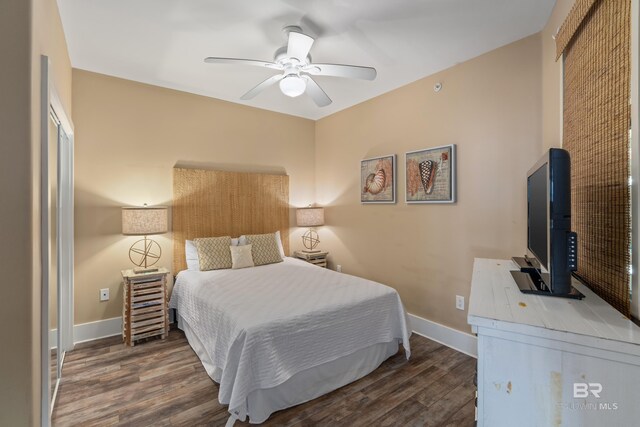 full bathroom with vanity, shower / tub combo with curtain, toilet, and tile patterned floors