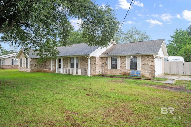 ranch-style house with a garage, a porch, and a front lawn