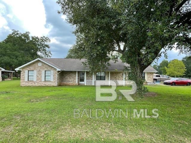 ranch-style house with a front yard