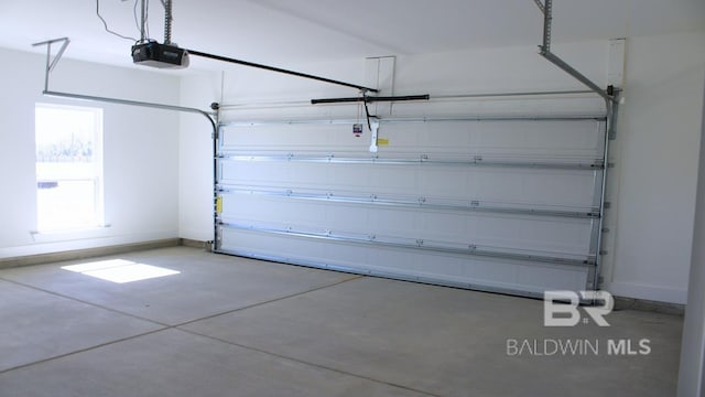 12681 Shoshoney Cir, Fairhope, AL 36532 - garage with a garage door opener and baseboards