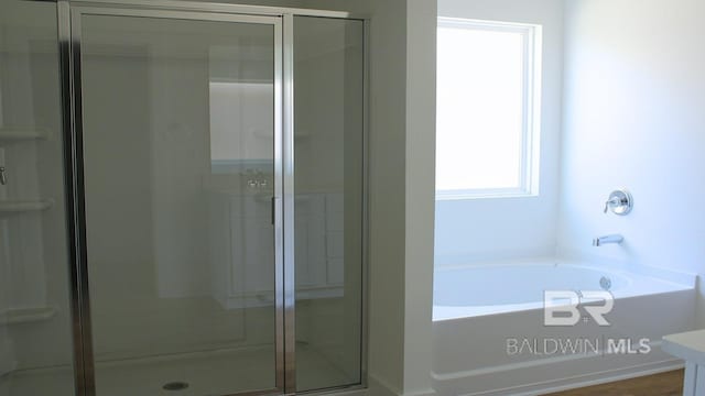 12681 Shoshoney Cir, Fairhope, AL 36532 - bathroom featuring a stall shower and a bath