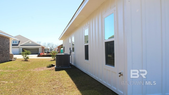 12681 Shoshoney Cir, Fairhope, AL 36532 - view of green lawn featuring central AC unit