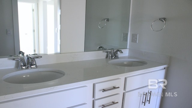 12681 Shoshoney Cir, Fairhope, AL 36532 - bathroom featuring double vanity