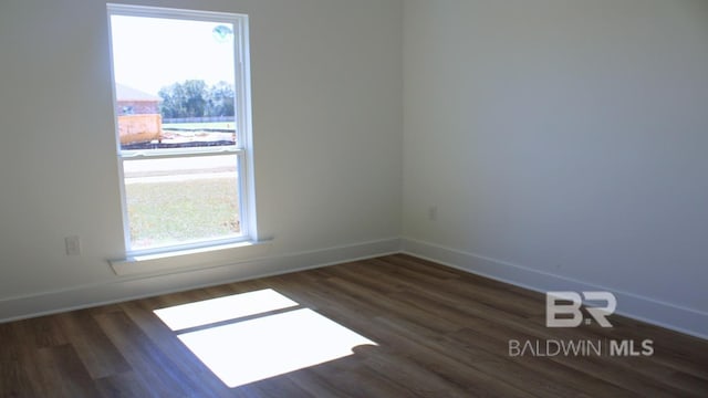 12681 Shoshoney Cir, Fairhope, AL 36532 - spare room featuring wood finished floors and baseboards