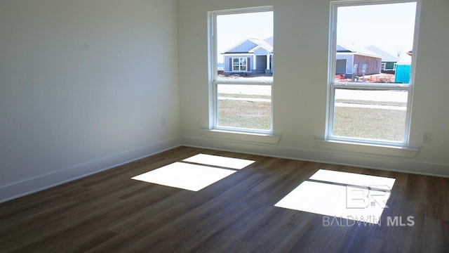 12681 Shoshoney Cir, Fairhope, AL 36532 - empty room featuring baseboards and wood finished floors
