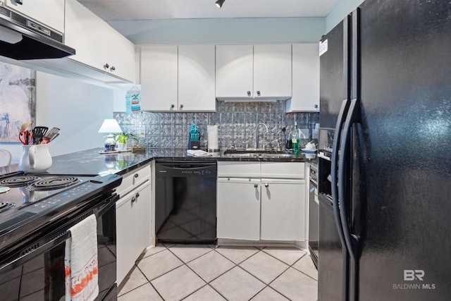 kitchen with white cabinetry, black appliances, tasteful backsplash, and range hood