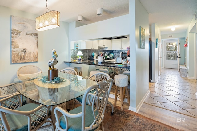 view of tiled dining area