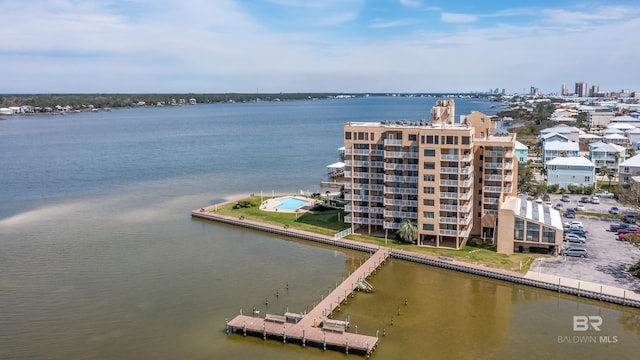 birds eye view of property featuring a water view