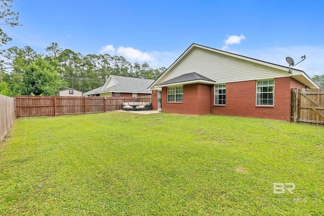 3677 Ashton Ct, Gulf Shores, AL 36542 - rear view of house featuring a patio area and brick siding