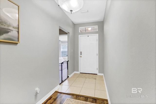 3677 Ashton Ct, Gulf Shores, AL 36542 - foyer featuring baseboards and light wood-type flooring