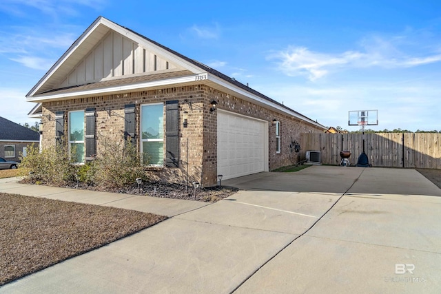 view of side of property with a garage