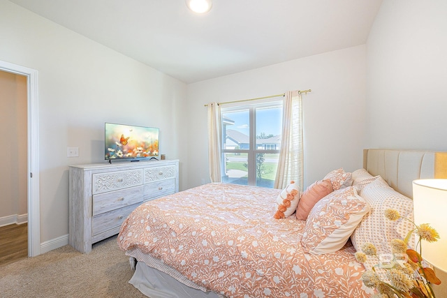 bedroom with light carpet