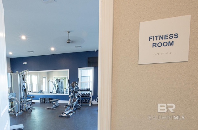 workout area featuring ceiling fan