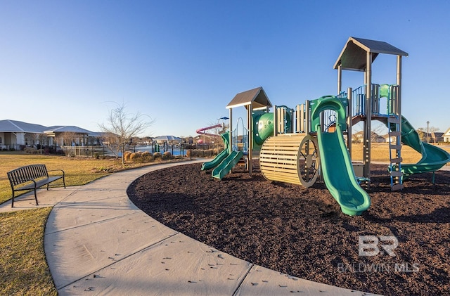 view of playground with a yard