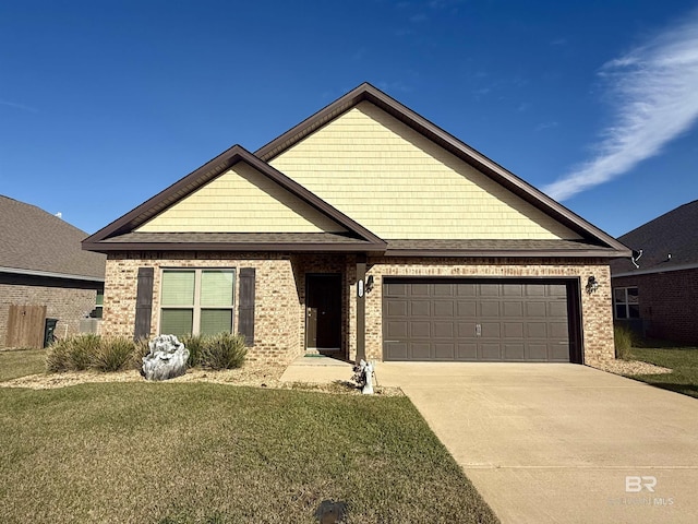 craftsman-style home with an attached garage, driveway, a front yard, and brick siding