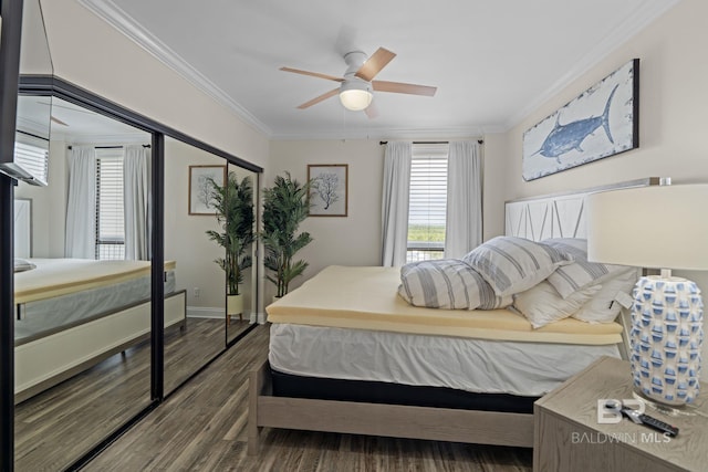 bedroom featuring ceiling fan, baseboards, crown molding, and wood finished floors