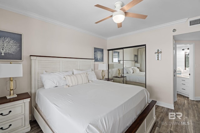 bedroom with dark wood-style flooring, baseboards, visible vents, ceiling fan, and ornamental molding