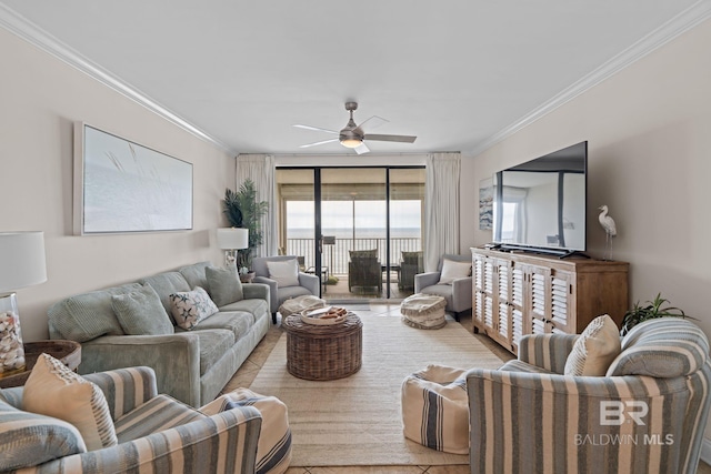 living room with ceiling fan and crown molding