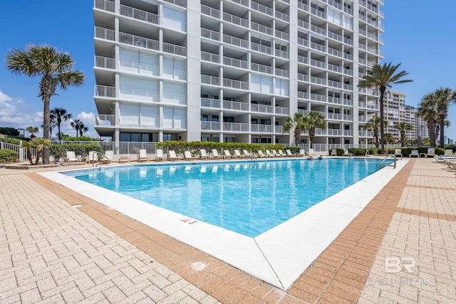 community pool featuring fence