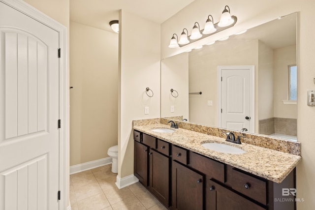 1077 Crown Walk Dr, Foley, AL 36535 - full bath with double vanity, a sink, toilet, and tile patterned flooring