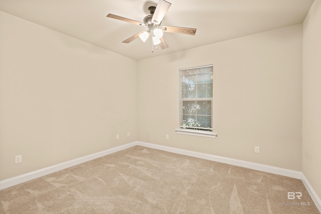 1077 Crown Walk Dr, Foley, AL 36535 - unfurnished room with light colored carpet, ceiling fan, and baseboards