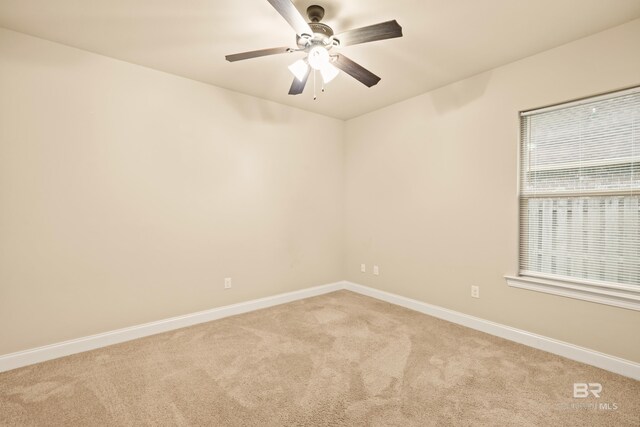 1077 Crown Walk Dr, Foley, AL 36535 - unfurnished room with baseboards, light colored carpet, and ceiling fan