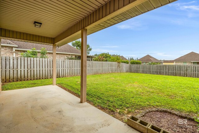 1077 Crown Walk Dr, Foley, AL 36535 - view of yard with a fenced backyard and a patio