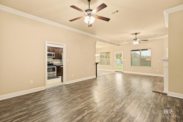 1077 Crown Walk Dr, Foley, AL 36535 - unfurnished living room with dark wood-style floors, ceiling fan, visible vents, and crown molding