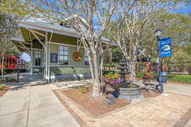 1077 Crown Walk Dr, Foley, AL 36535 - view of patio / terrace featuring covered porch and fence