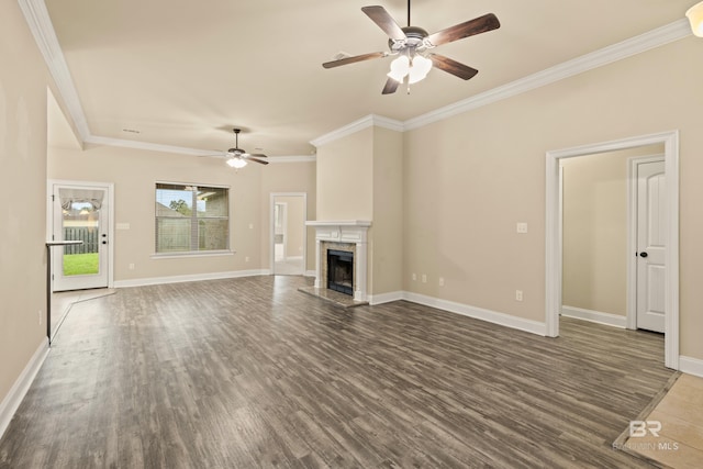 1077 Crown Walk Dr, Foley, AL 36535 - unfurnished living room with a fireplace, dark wood-style flooring, ornamental molding, and a ceiling fan