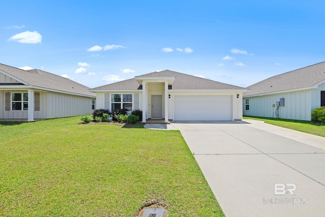 23159 Shadowridge Dr, Daphne, AL 36526 - single story home featuring an attached garage, driveway, a front yard, board and batten siding, and a shingled roof