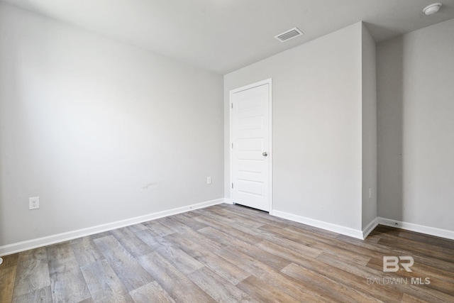 23159 Shadowridge Dr, Daphne, AL 36526 - spare room with wood finished floors and a smoke detector