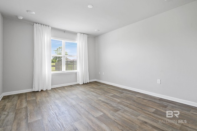23159 Shadowridge Dr, Daphne, AL 36526 - empty room featuring wood finished floors and baseboards
