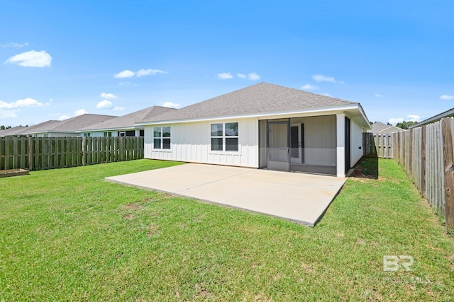 23159 Shadowridge Dr, Daphne, AL 36526 - rear view of house featuring a fenced backyard, a patio area, board and batten siding, and a shingled roof