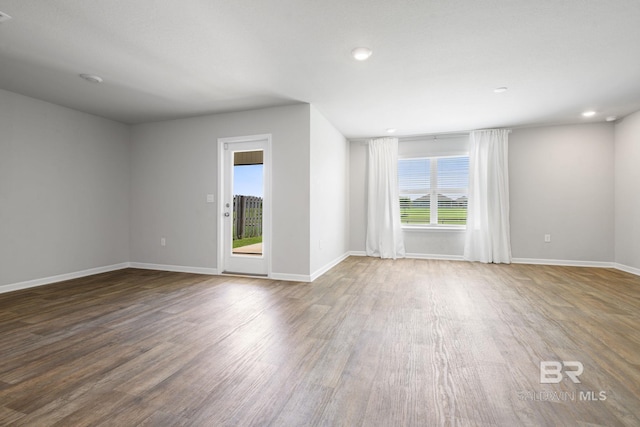 23159 Shadowridge Dr, Daphne, AL 36526 - spare room with wood finished floors and recessed lighting