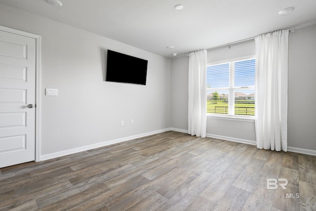 23159 Shadowridge Dr, Daphne, AL 36526 - spare room with wood finished floors and baseboards