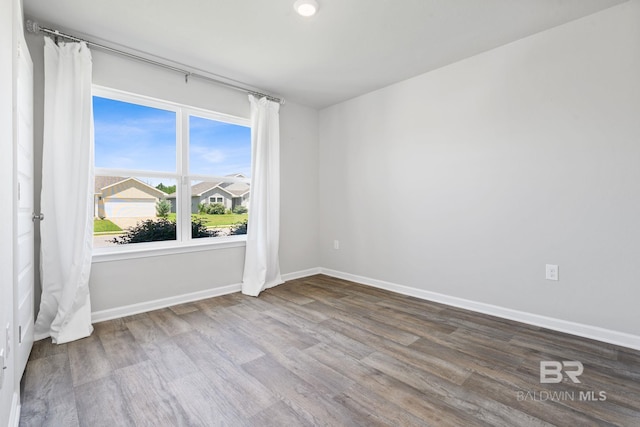 23159 Shadowridge Dr, Daphne, AL 36526 - spare room featuring wood finished floors and recessed lighting