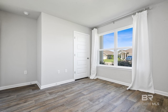 23159 Shadowridge Dr, Daphne, AL 36526 - spare room with wood finished floors and a smoke detector