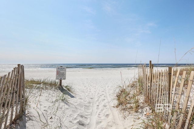 view of water feature with a beach view