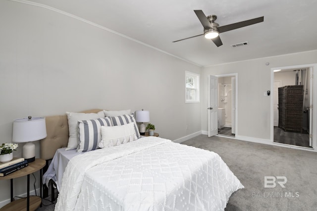 5922 Sunnyside Dr, Mobile, AL 36619 - bedroom with baseboards, ornamental molding, carpet, a ceiling fan, and connected bathroom