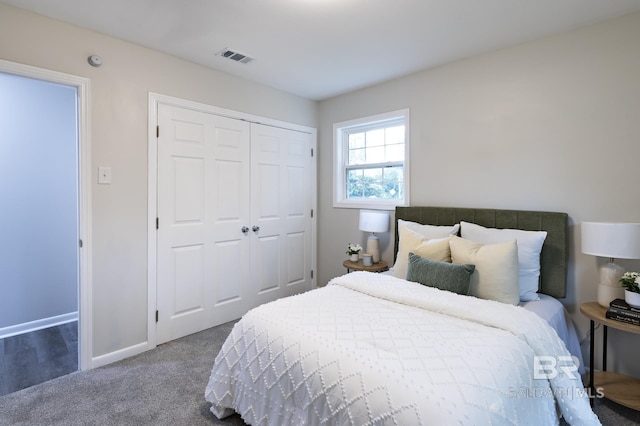 5922 Sunnyside Dr, Mobile, AL 36619 - bedroom featuring a closet, carpet flooring, and baseboards