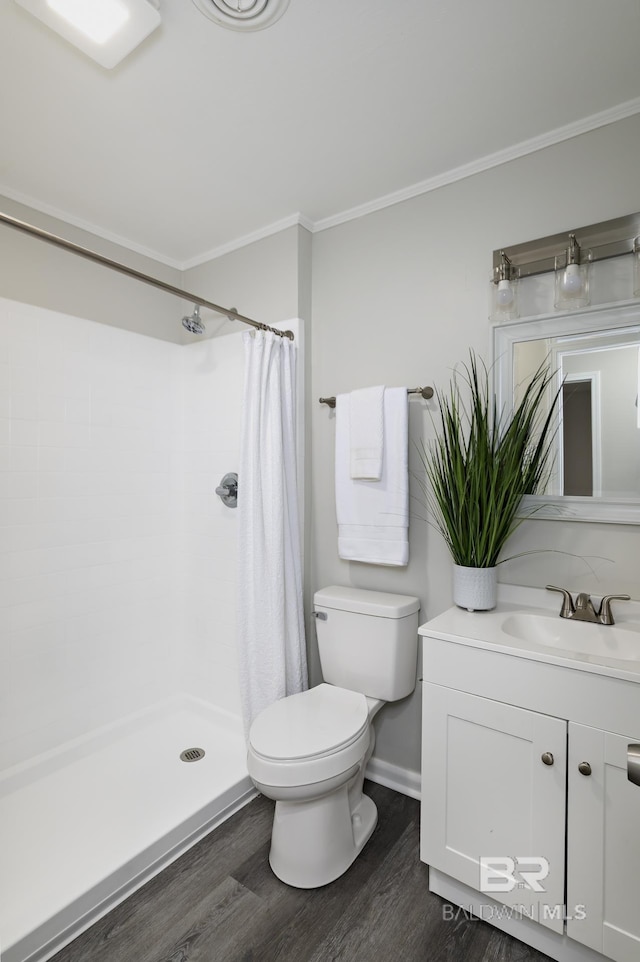 5922 Sunnyside Dr, Mobile, AL 36619 - bathroom with ornamental molding, toilet, wood finished floors, a shower with curtain, and vanity