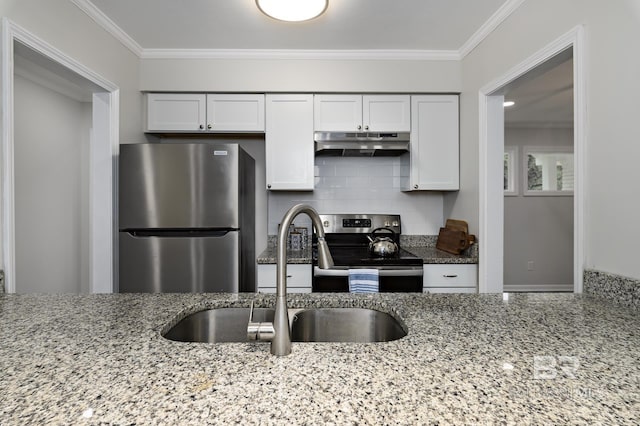 5922 Sunnyside Dr, Mobile, AL 36619 - kitchen with appliances with stainless steel finishes, under cabinet range hood, a sink, ornamental molding, and light stone counters