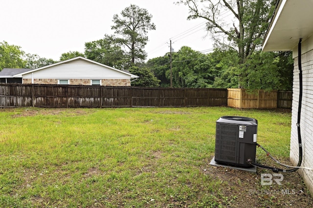 5922 Sunnyside Dr, Mobile, AL 36619 - view of yard featuring central air condition unit