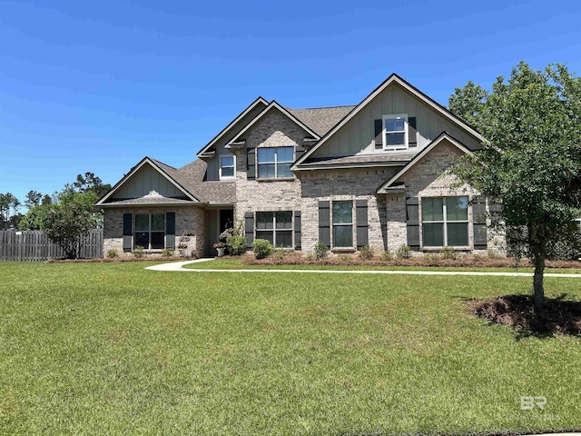 32035 Bobwhite Rd, Spanish Fort, AL 36527 - craftsman house with board and batten siding, brick siding, and a front yard