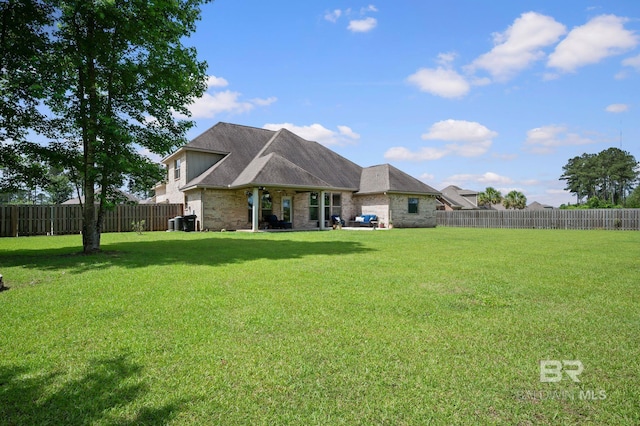 32035 Bobwhite Rd, Spanish Fort, AL 36527 - rear view of property with brick siding