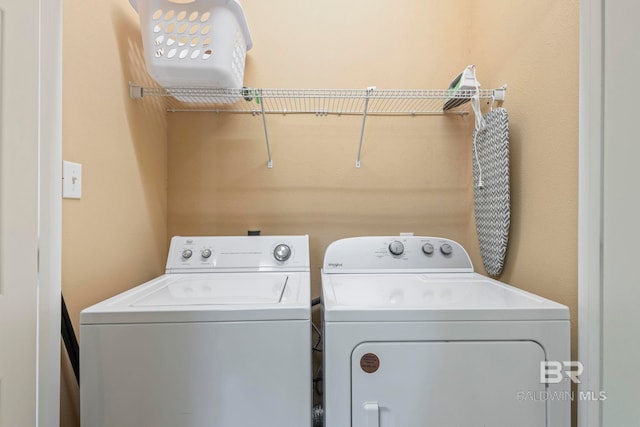 laundry area featuring washer and clothes dryer