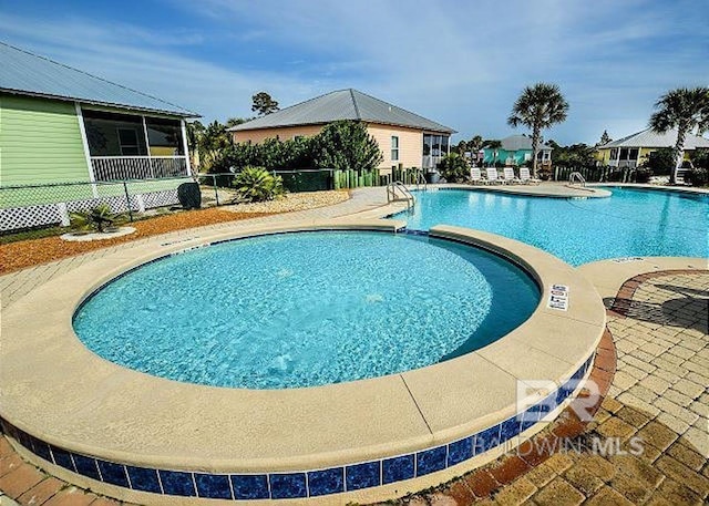 view of pool with a patio area