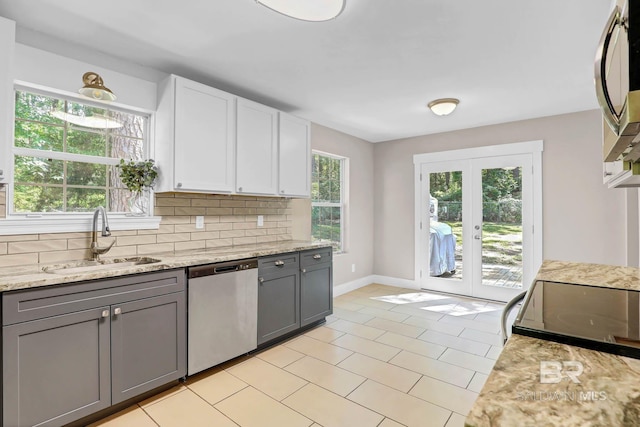 106 Gordon Cir, Daphne, AL 36526 - kitchen with dishwasher, gray cabinetry, tasteful backsplash, and light stone countertops