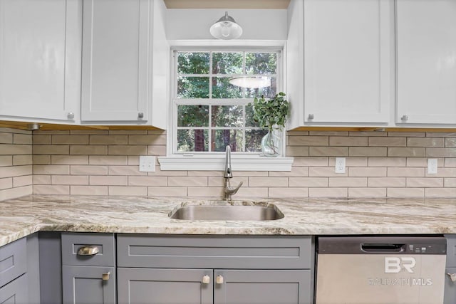106 Gordon Cir, Daphne, AL 36526 - kitchen featuring dishwasher, gray cabinetry, light stone countertops, and decorative backsplash
